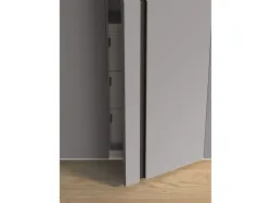 Hinged wardrobe with Aries door. Cotton interior, doors in matte lacquered Basalt. 300x260.