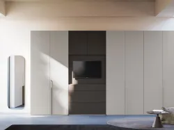 Hinged wardrobe with smooth door, TV unit with drawers in matte Titanium and Tufo finish.