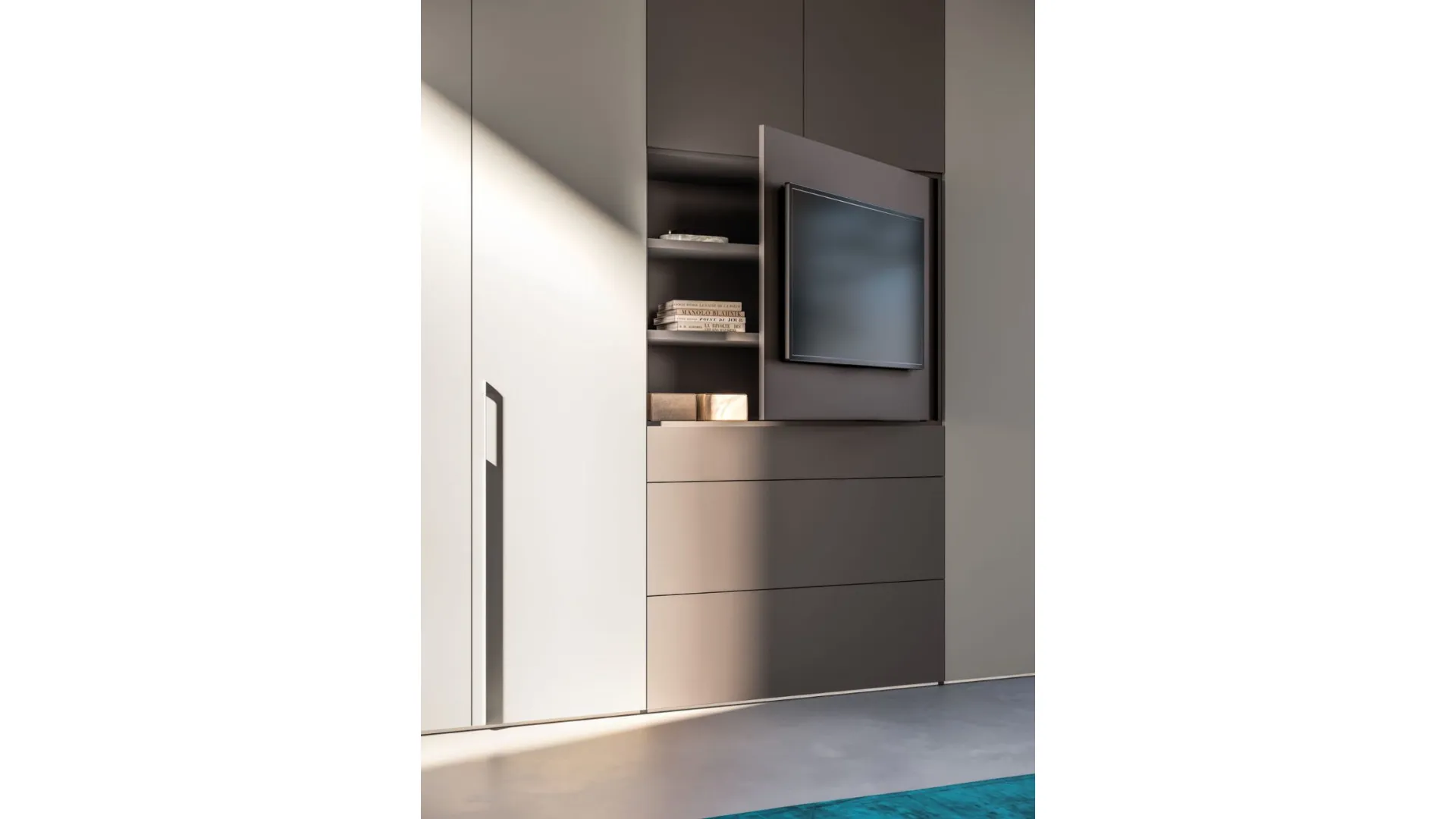 Swing wardrobe with smooth door, TV visual element with drawers in matte Titanium and Tufo finish.