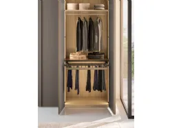 Wardrobe swing door in oak wood finish, doors in matte anthracite lacquer with metal lacquered profile.