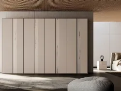 Wardrobe with doors in Tortora melamine with vertical marble melamine band.