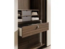 Sliding wardrobe with Ark door. Interior in terracotta, doors in Avana melamine decor.