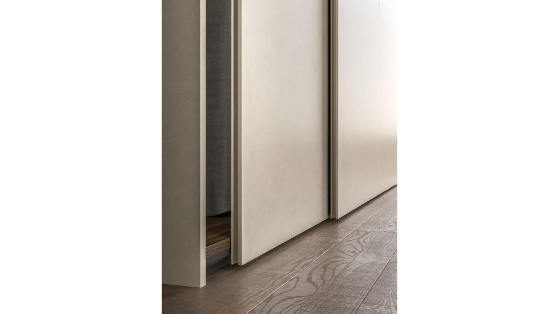 Sliding wardrobe with Arka door. Interior in terracotta, doors in Avana melamine decor.