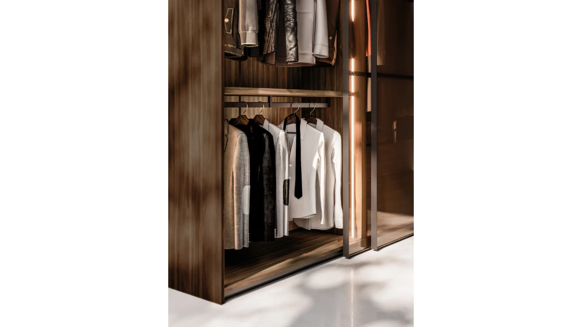 Sliding wardrobe with Frame door. Interior in terracotta, Frame doors in bronzed glass and burnished metal.