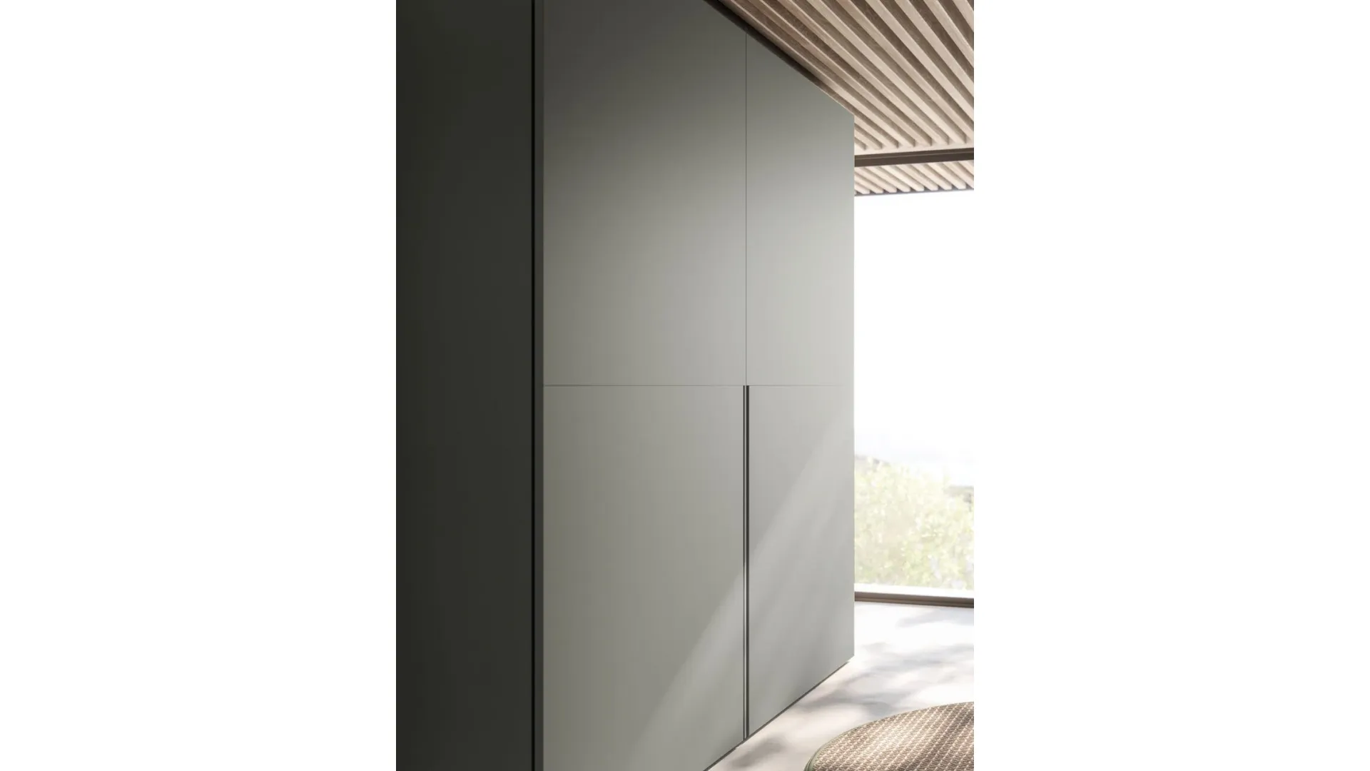 Sliding wardrobe interior in Cotton, doors and Gola handles in Matte Lead lacquer.