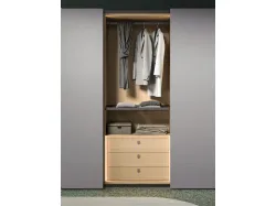 Sliding wardrobe with door and dedicated handle. Interior in oak, doors and handles in Basalt lacquered.