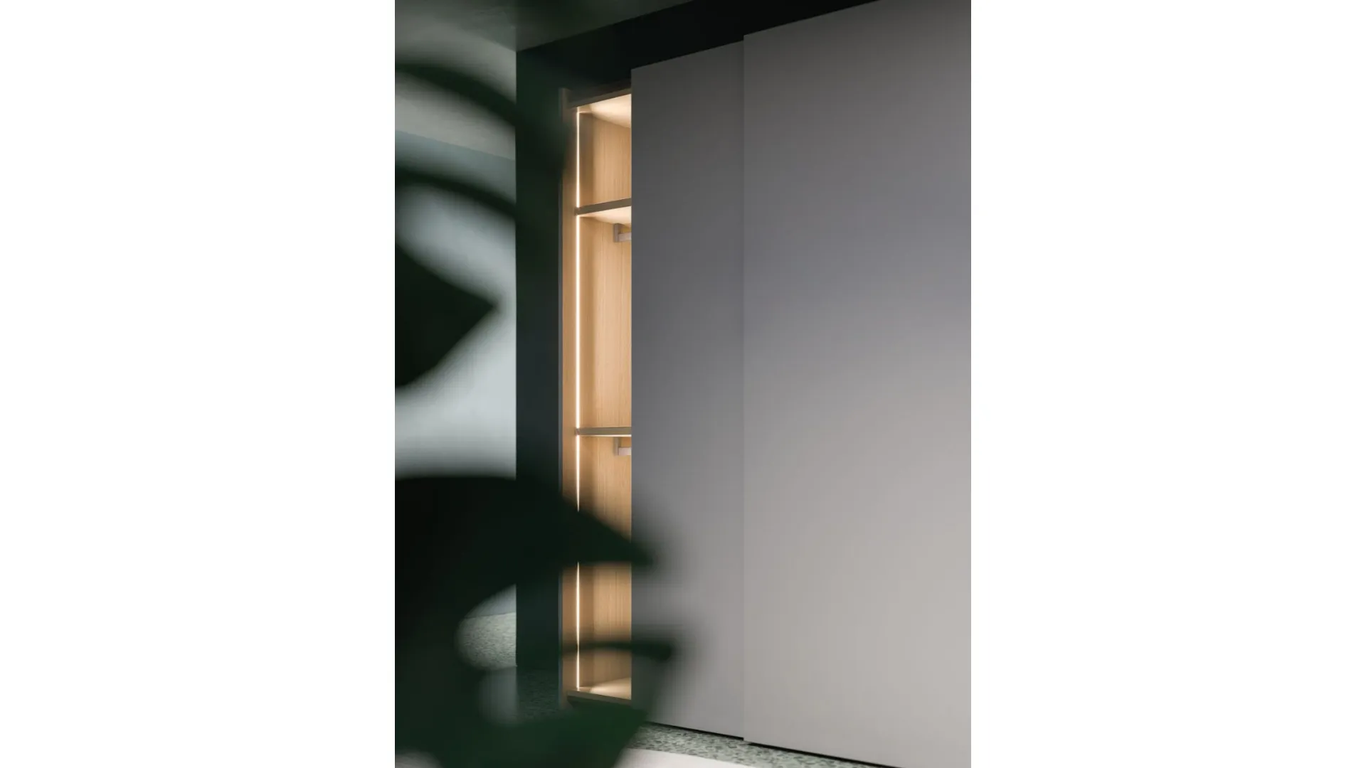 Sliding wardrobe with door and dedicated handle. Interior in Oak, doors and handles in Basalt lacquer.