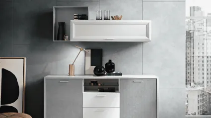 Modern sideboard with inclined feet, open compartments and suspended wall unit in silver/white finish.