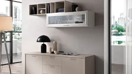 Modern sideboard with drawer and central open compartment, wall units suspended in grey and white finishes.