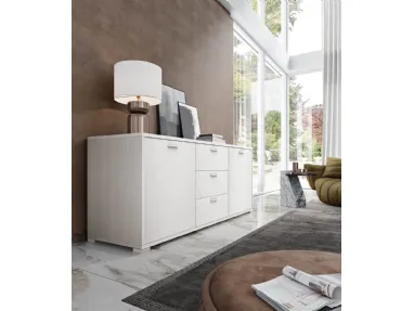 Modern sideboard with two doors, three central drawers, and a large surface area.