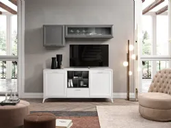 Modern mobile living with an elegant sideboard at the base, suspended wall units and open compartments.