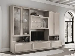 Modern equipped wall unit with drawers at the base, display cabinets with swinging doors, and open compartments.