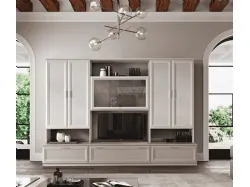 Modern living room with side modules with hinged doors and drawers, central display cabinet.