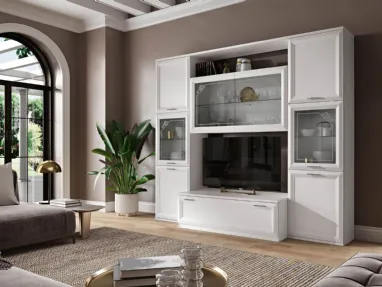 Modern living room complete with wall units, open compartments, and a large surface for support.