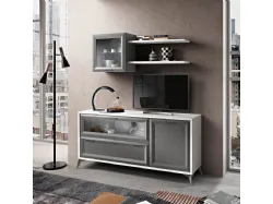 Living room complete with sideboard, wall cabinets and a TV area with shelves.