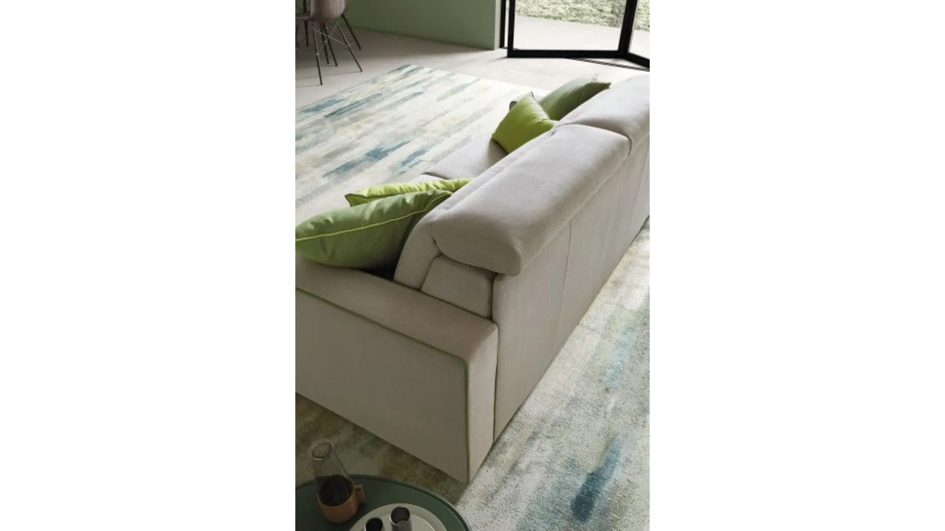 Two-seater fabric sofa bed with reclining headrests