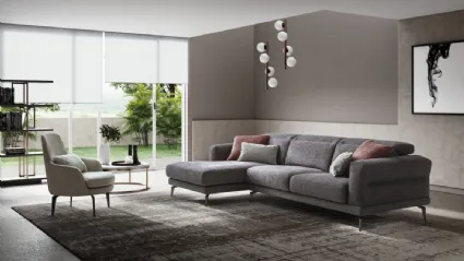 Lambert fabric sofa with extendable seat and reclining headrest.